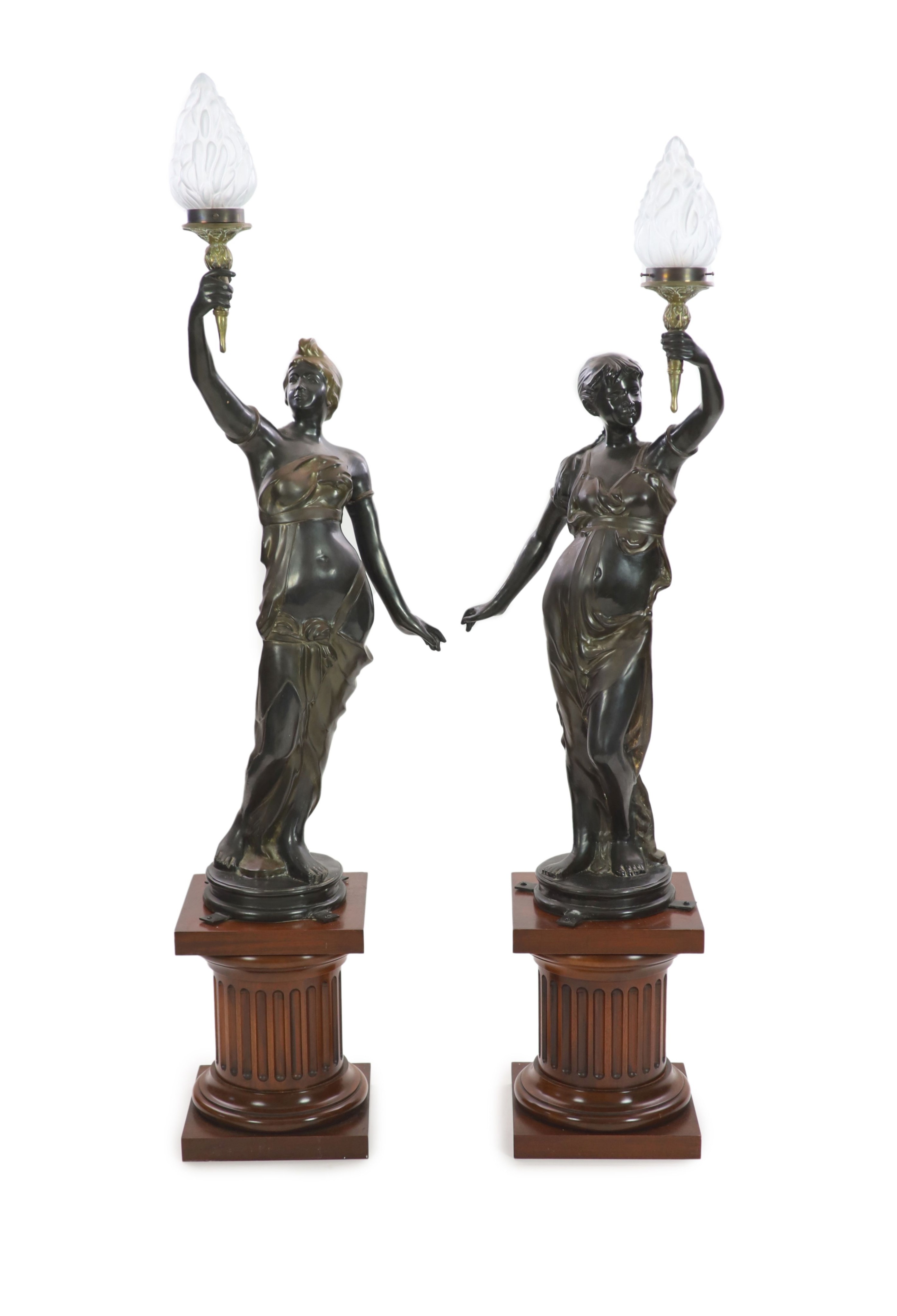A pair of 19th century style bronze figural torcheres, overall H 192cm